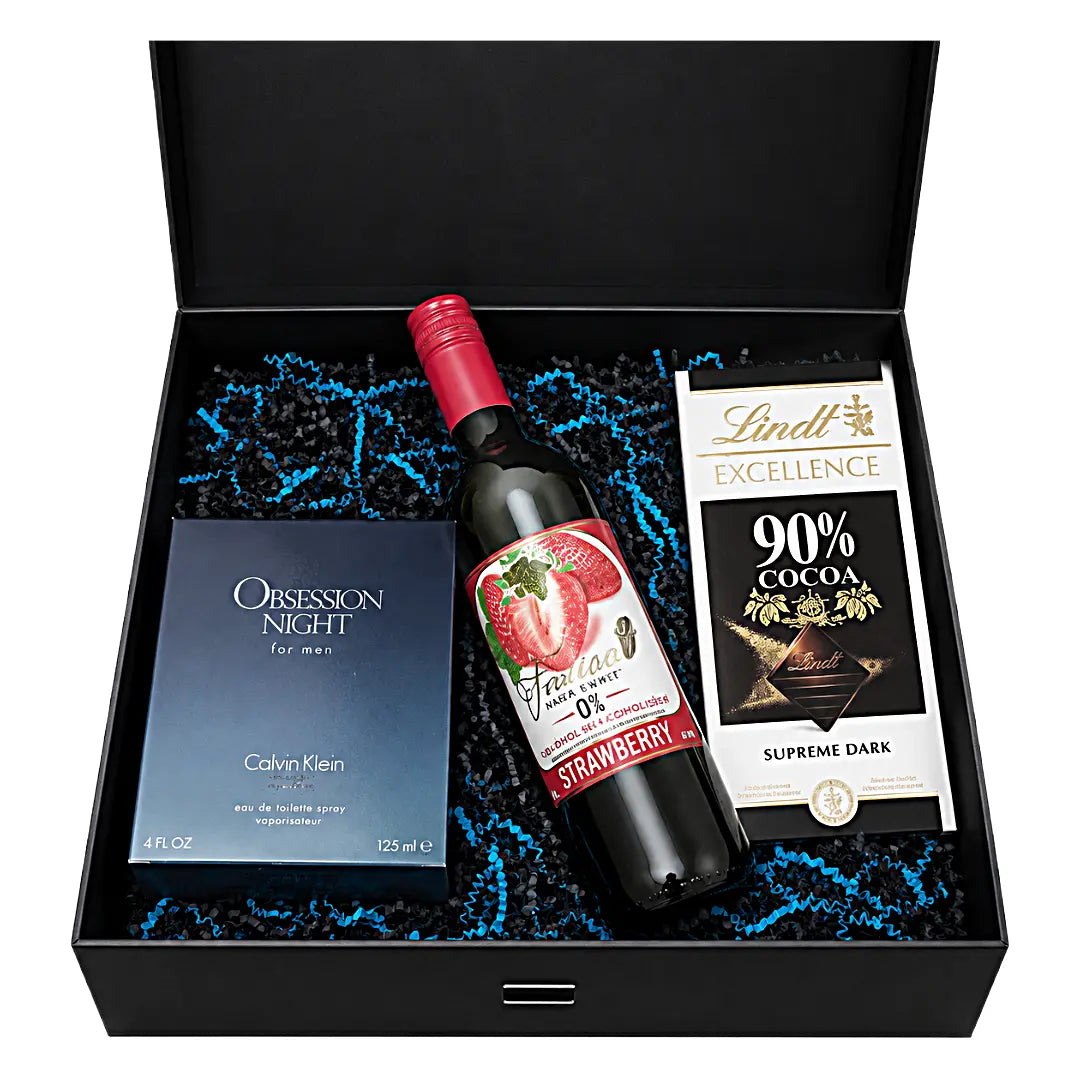 Gift set with a bottle of strawberry-flavored wine, Calvin Klein men's cologne, and Lindt chocolate bar.