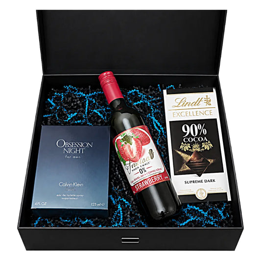 Gift set with a bottle of strawberry-flavored wine, Calvin Klein men's cologne, and Lindt chocolate bar.