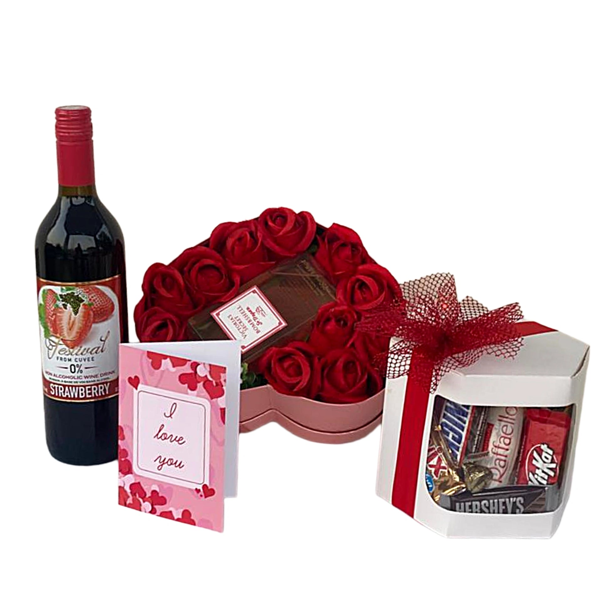 Gift set with wine, chocolate, and candy on a white background