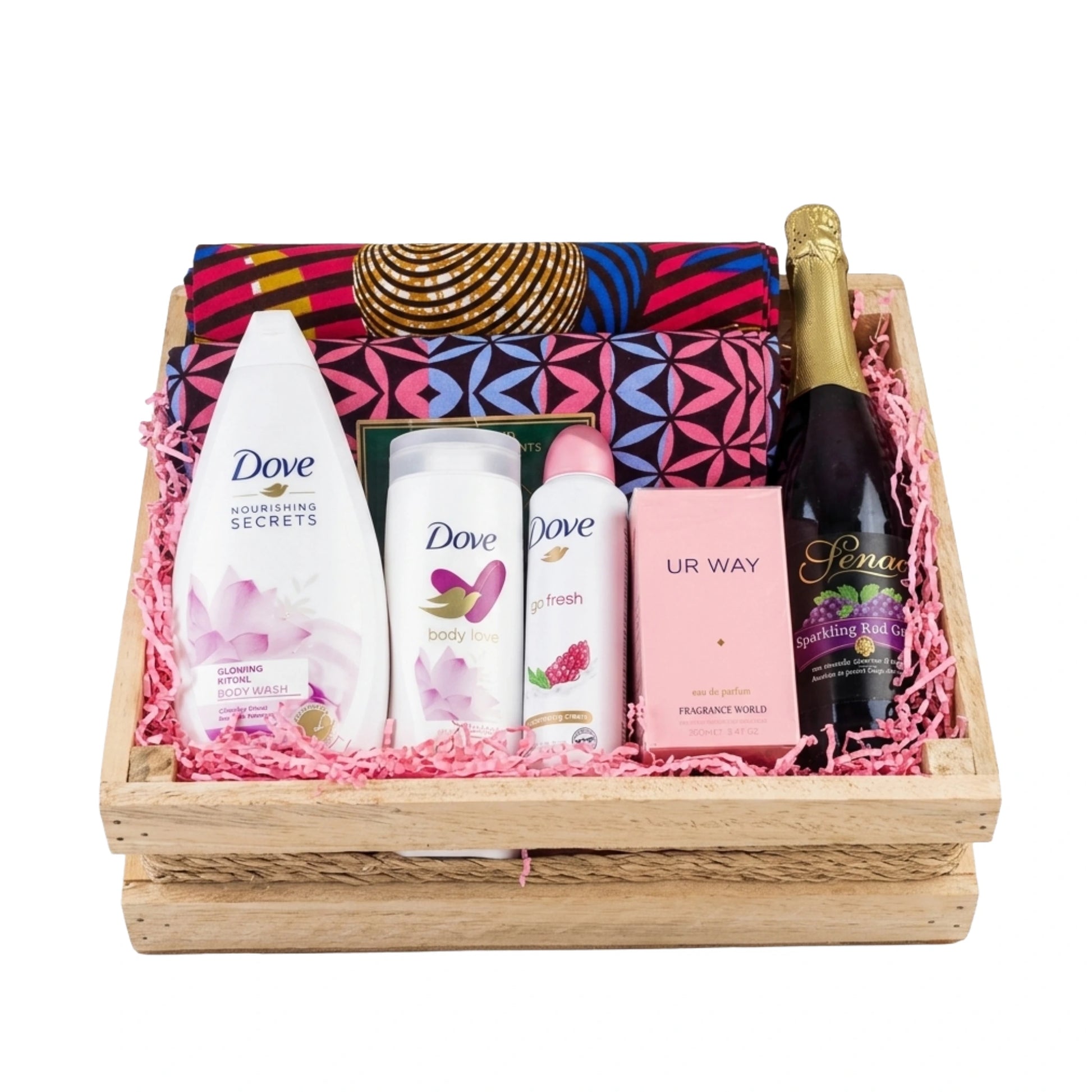 Gift basket with Dove products, a bottle of wine, and other items on a white background