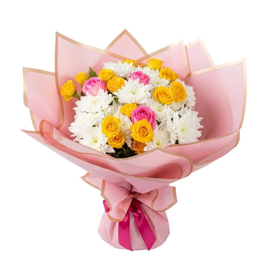 Bouquet of flowers wrapped in pink paper with a pink ribbon on a white background
