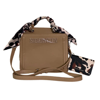 Tan handbag with patterned handle and strap, featuring the brand 'Steve Madden'.