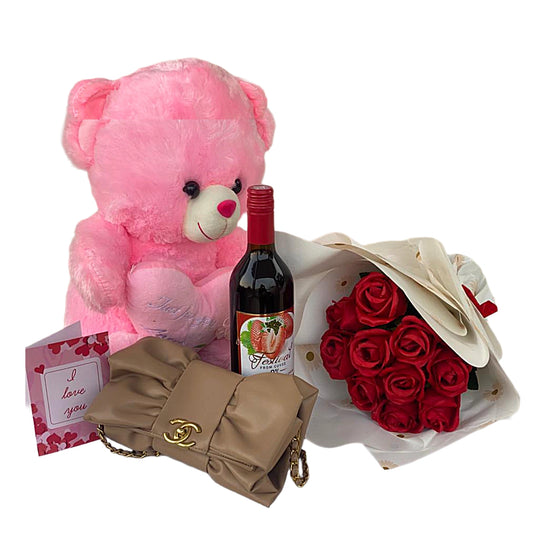 Pink teddy bear, bottle of wine, red roses, and beige handbag on a white background