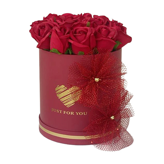 Red roses in a decorative box with 'Just for You' text on a white background